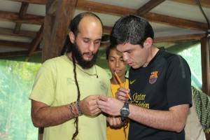 Alfredo (right) identifies a snake during the EDGE training course ©ZSL