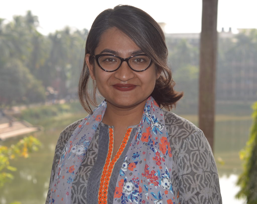 EDGE Fellow Alifa Haque headshot standing infront of a lake