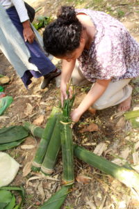 Preparing food in bamboo (c) Adrian W Lyngdoh